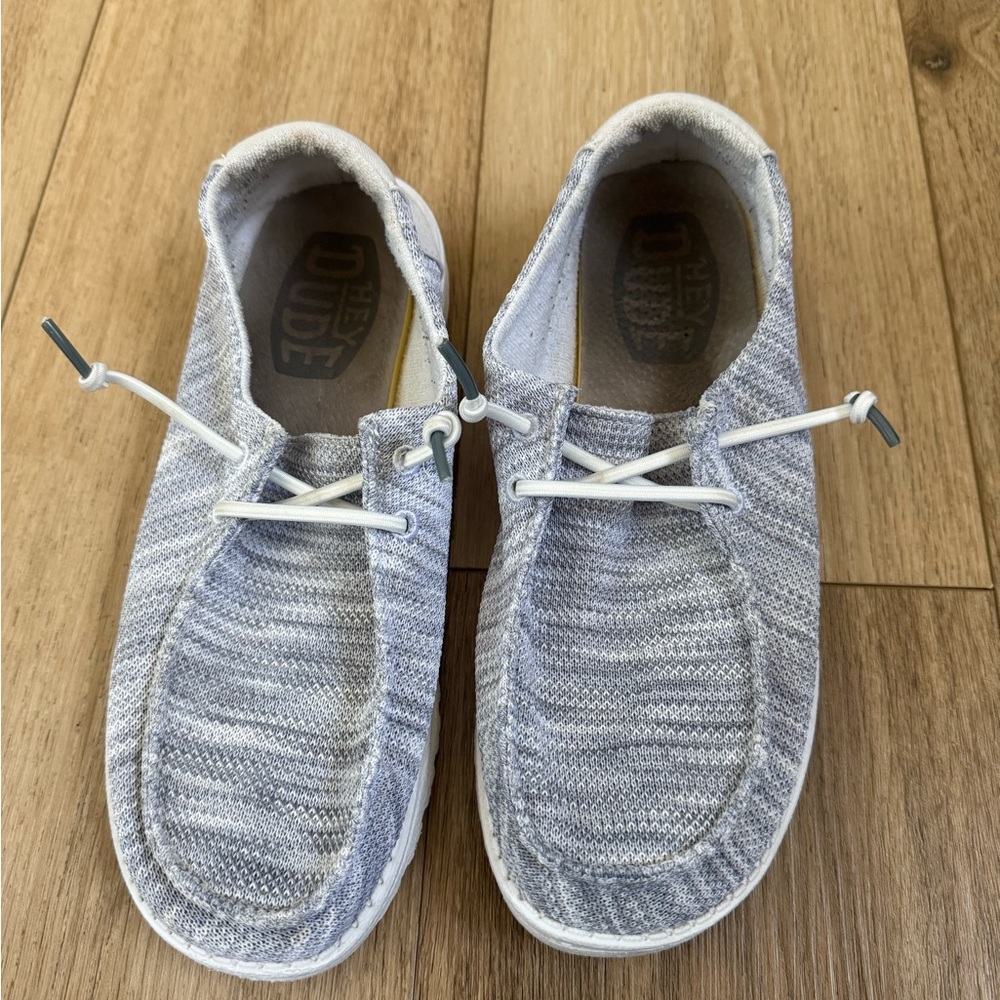 Hey Dude women’s Light Gray Slip-On shoes